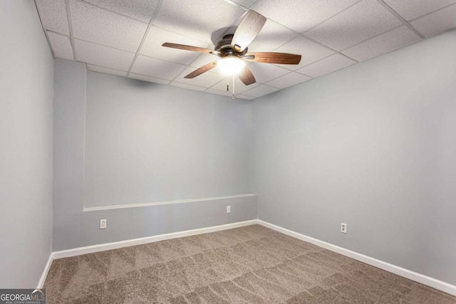 1924 Sweet Flag Rd, Lawrenceville, GA 30045 - spare room with a ceiling fan, carpet flooring, a paneled ceiling, and baseboards