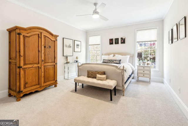 bedroom with baseboards, multiple windows, crown molding, and light carpet