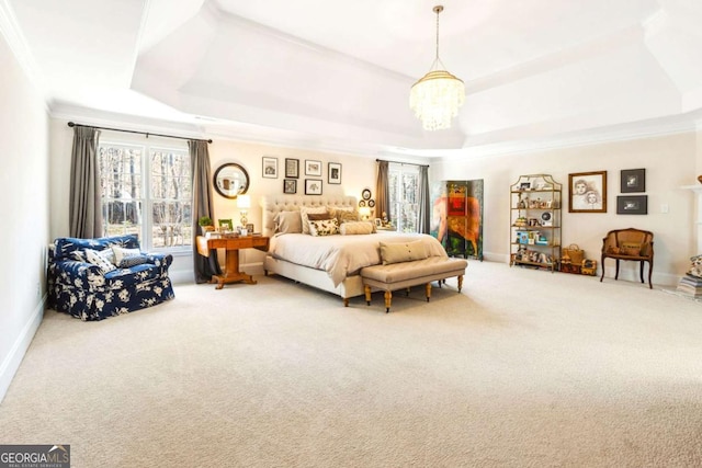 bedroom with an inviting chandelier, a raised ceiling, carpet flooring, and baseboards