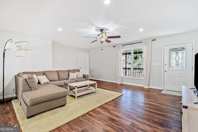 living room featuring dark wood finished floors, baseboards, recessed lighting, and a ceiling fan