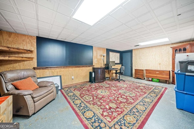living room with wooden walls