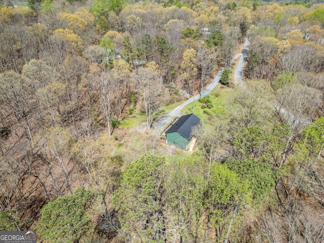 aerial view featuring a forest view