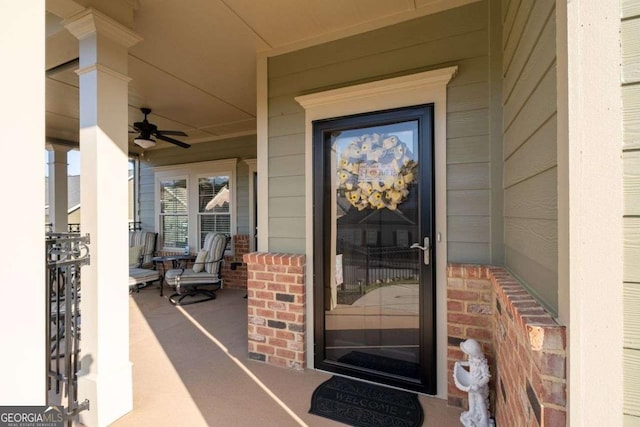 57 Cedarcrest Village Ln, Acworth, GA 30101 - doorway to property with covered porch, brick siding, and a ceiling fan
