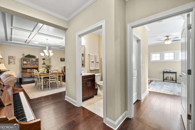 57 Cedarcrest Village Ln, Acworth, GA 30101 - hallway with ornamental molding, a chandelier, light wood-style floors, and baseboards