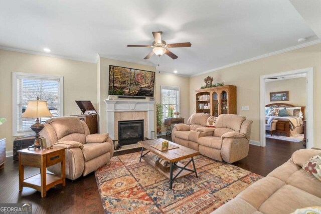 57 Cedarcrest Village Ln, Acworth, GA 30101 - living area with ceiling fan, dark wood finished floors, plenty of natural light, a tile fireplace, and ornamental molding