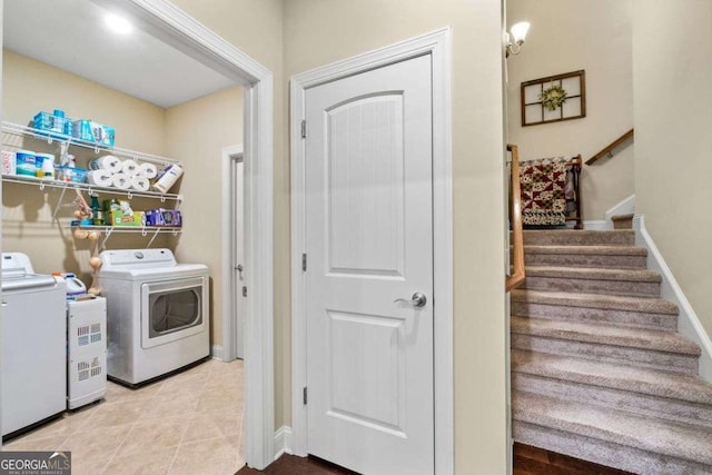 57 Cedarcrest Village Ln, Acworth, GA 30101 - laundry room featuring washing machine and clothes dryer and baseboards