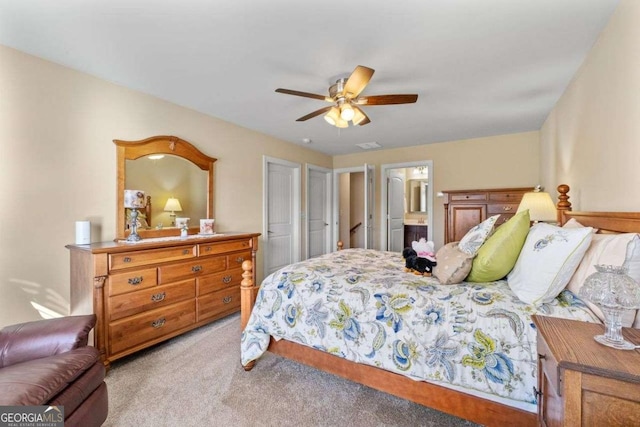 57 Cedarcrest Village Ln, Acworth, GA 30101 - bedroom featuring light carpet, connected bathroom, and a ceiling fan