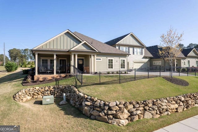 57 Cedarcrest Village Ln, Acworth, GA 30101 - view of front of property featuring board and batten siding, ceiling fan, driveway, and a garage