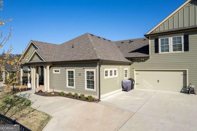 57 Cedarcrest Village Ln, Acworth, GA 30101 - view of front of house featuring board and batten siding, driveway, roof with shingles, and an attached garage