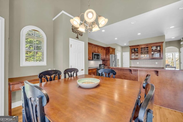 4463 N Gate Dr, Gainesville, GA 30506 - dining space featuring an inviting chandelier, light wood-style floors, and recessed lighting