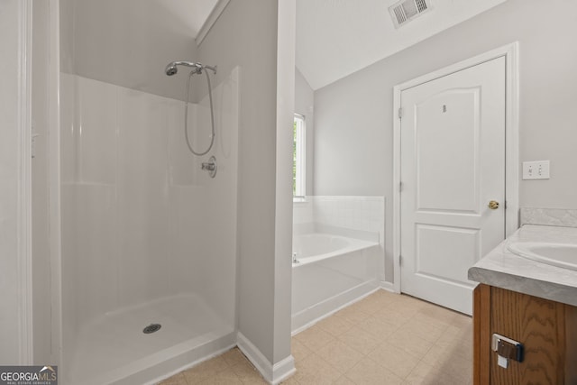 60 Charlotte Blvd, Stockbridge, GA 30281 - bathroom featuring a bath, visible vents, a shower, and lofted ceiling