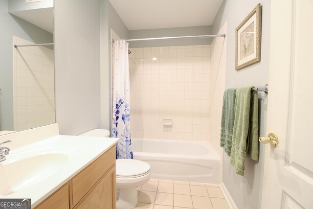 bathroom featuring toilet, tile patterned flooring, vanity, and shower / bath combo
