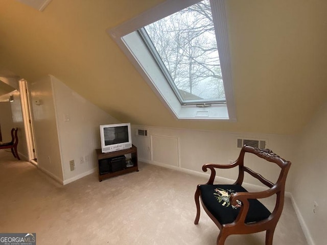 364 Cardinal Ln, Toccoa, GA 30577 - sitting room featuring a skylight, carpet, vaulted ceiling, and baseboards
