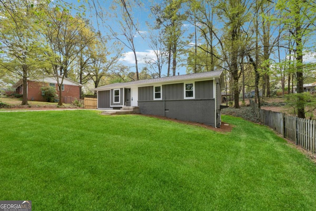 2115 Randolph Cir NW, Kennesaw, GA 30144 - view of front facade with board and batten siding and brick siding