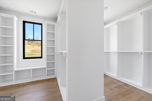 100 Forest Pl, Forsyth, GA 31029 - spacious closet featuring wood finished floors