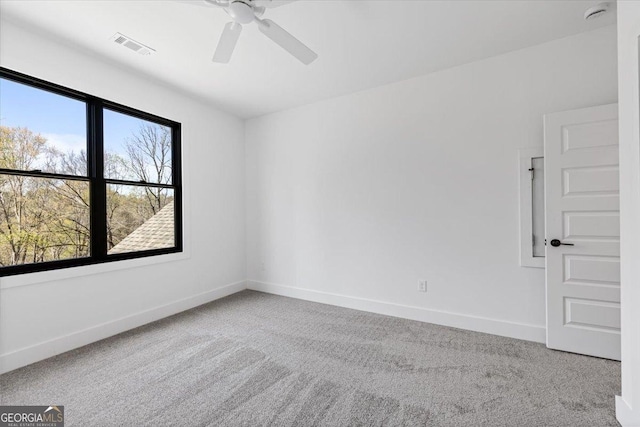 100 Forest Pl, Forsyth, GA 31029 - unfurnished room with carpet flooring, baseboards, a ceiling fan, and a smoke detector