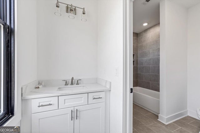 100 Forest Pl, Forsyth, GA 31029 - full bathroom featuring baseboards, vanity, and bathtub / shower combination