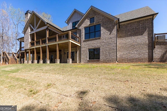 100 Forest Pl, Forsyth, GA 31029 - back of house with a lawn, brick siding, a chimney, and board and batten siding