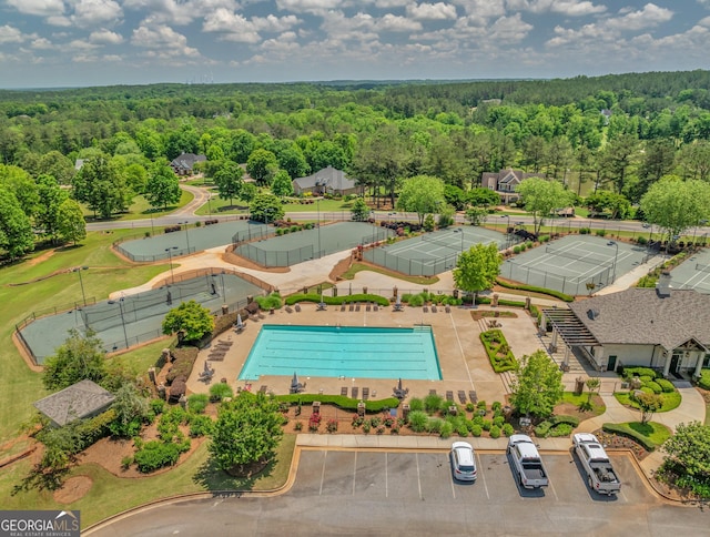 100 Forest Pl, Forsyth, GA 31029 - drone / aerial view of a forest and a pool area