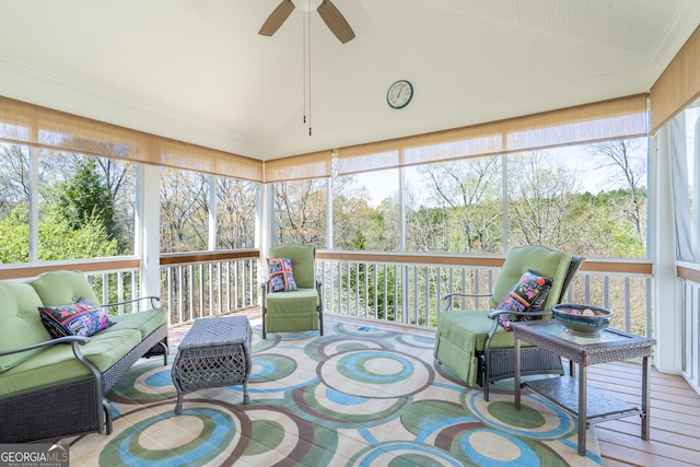 sunroom with an outdoor living space and a ceiling fan