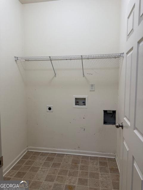 laundry area with baseboards, washer hookup, hookup for an electric dryer, and laundry area