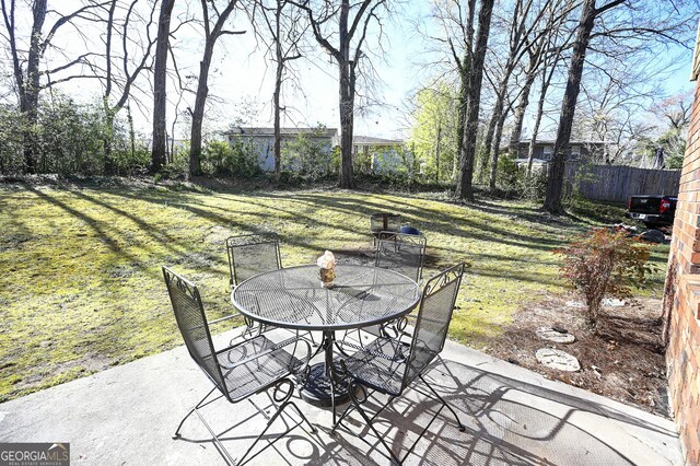 view of patio / terrace with fence and outdoor dining area
