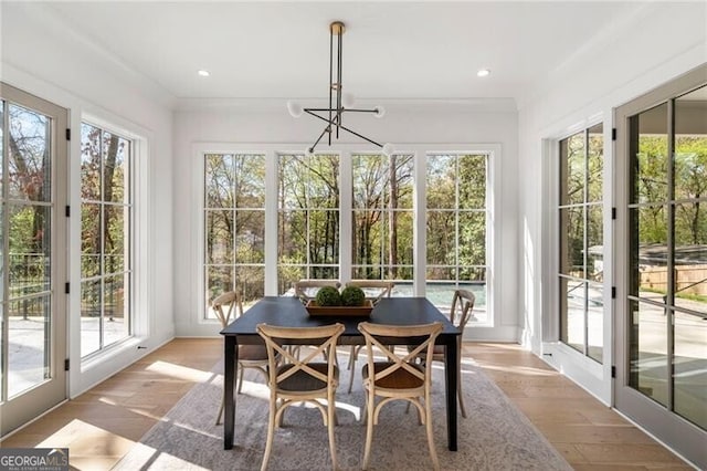 1074 Moores Mill Rd NW, Atlanta, GA 30327 - sunroom featuring healthy amount of natural light, a chandelier, and french doors