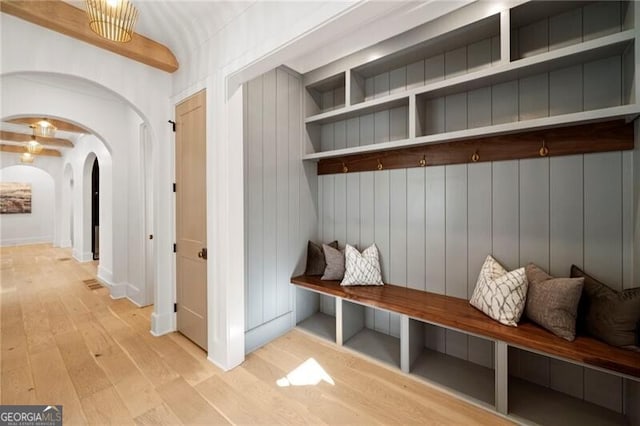 1074 Moores Mill Rd NW, Atlanta, GA 30327 - mudroom with arched walkways and hardwood / wood-style floors