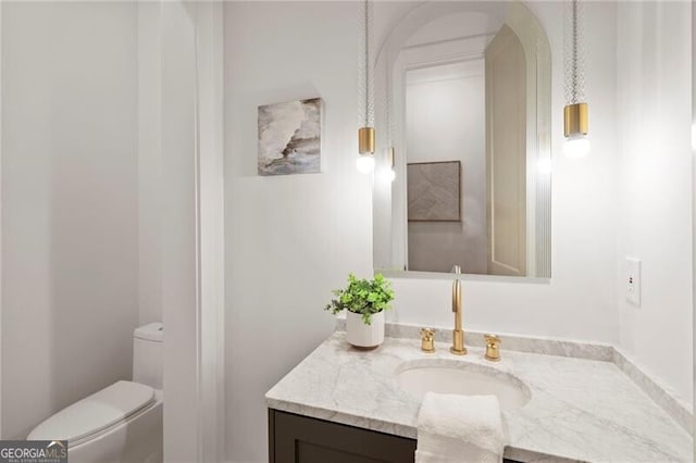 1074 Moores Mill Rd NW, Atlanta, GA 30327 - bathroom featuring vanity and toilet