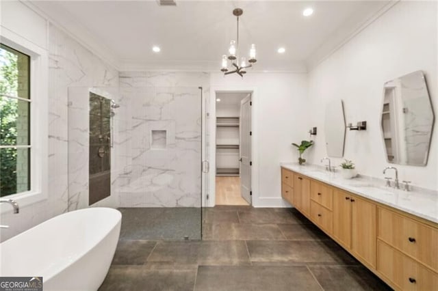 1074 Moores Mill Rd NW, Atlanta, GA 30327 - bathroom with ornamental molding, a soaking tub, double vanity, a marble finish shower, and a chandelier