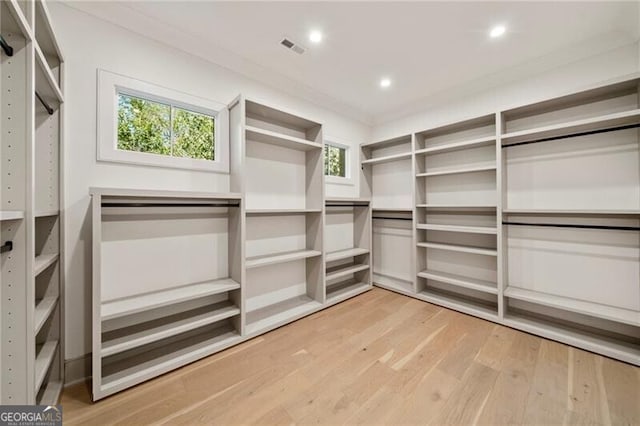 1074 Moores Mill Rd NW, Atlanta, GA 30327 - spacious closet with light wood finished floors