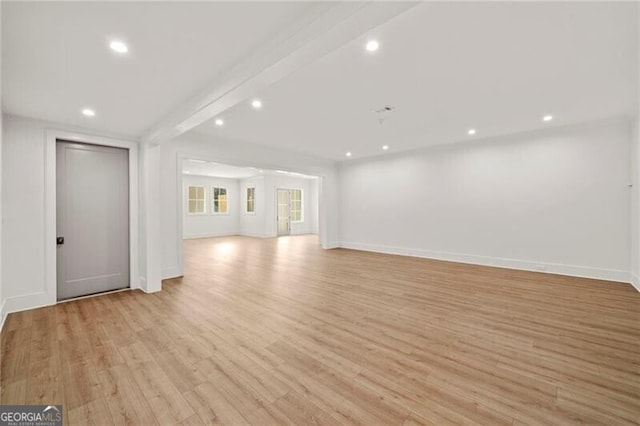 1074 Moores Mill Rd NW, Atlanta, GA 30327 - unfurnished living room featuring light wood finished floors and recessed lighting