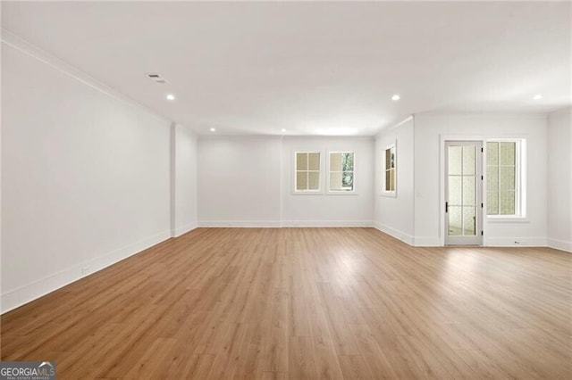 1074 Moores Mill Rd NW, Atlanta, GA 30327 - spare room featuring light wood-style floors and recessed lighting