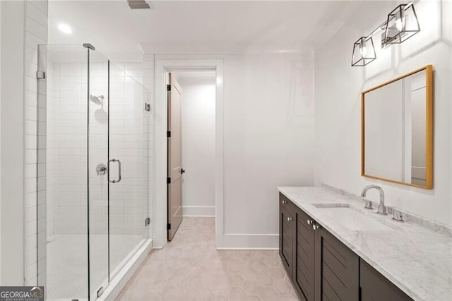 1074 Moores Mill Rd NW, Atlanta, GA 30327 - full bath featuring vanity, a stall shower, and tile patterned floors