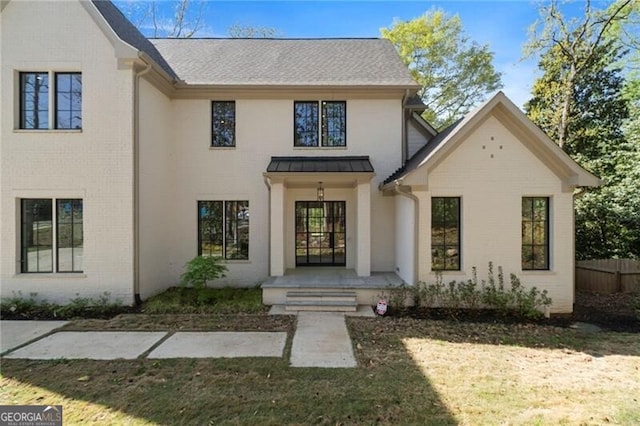 1074 Moores Mill Rd NW, Atlanta, GA 30327 - view of front of home featuring a standing seam roof and a shingled roof
