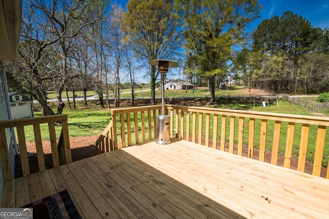 deck featuring a yard