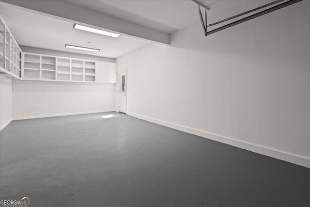 garage with baseboards