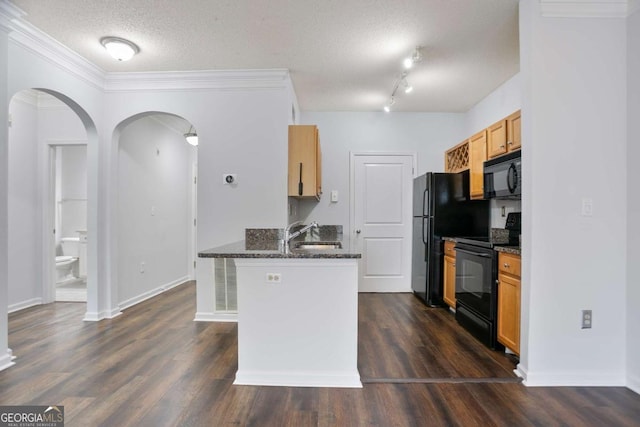 4333 Dunwoody Park Unit 1211, Atlanta, GA 30338 - kitchen with black appliances, a textured ceiling, a peninsula, arched walkways, and dark wood-style flooring