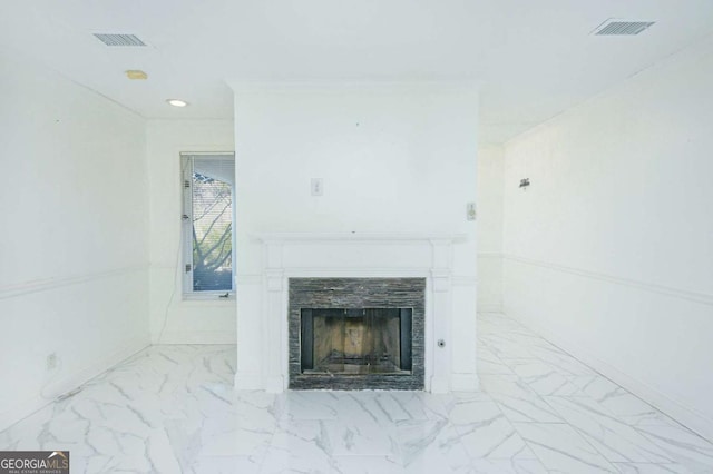 interior details with a fireplace and visible vents