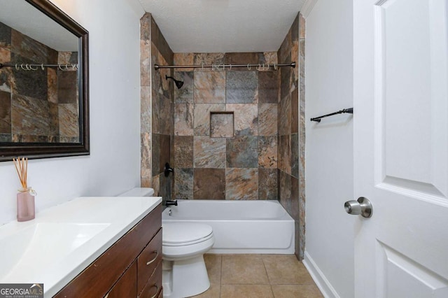 full bathroom with tile patterned floors, toilet, vanity, shower / bathtub combination, and a textured ceiling