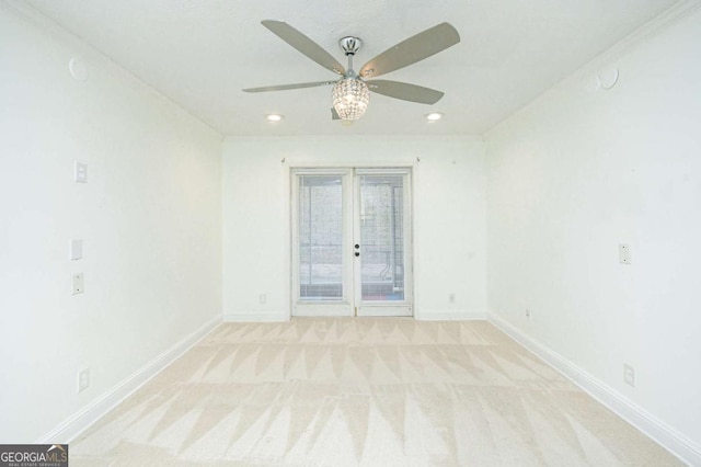 carpeted spare room featuring french doors, recessed lighting, baseboards, and ceiling fan