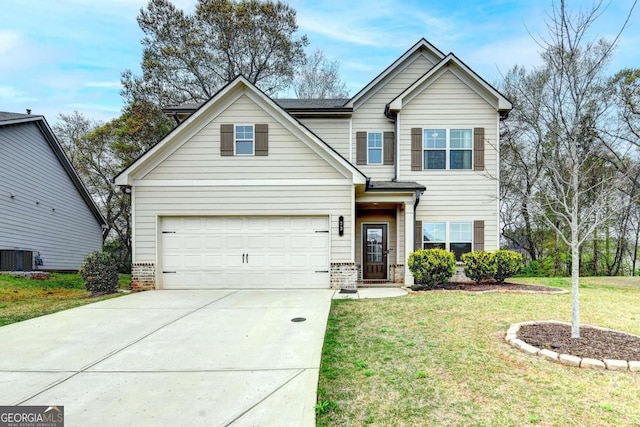 view of front facade with a front yard, concrete driveway, and central AC