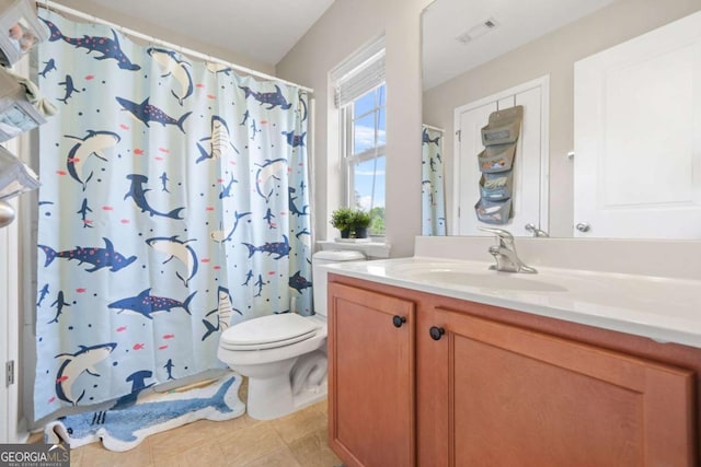 full bathroom with a shower with shower curtain, toilet, vanity, tile patterned flooring, and visible vents