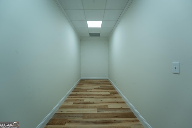 interior space with baseboards and light wood-style floors