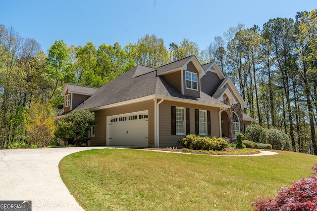 view of side of property featuring roof with shingles, a lawn, a garage, and concrete driveway