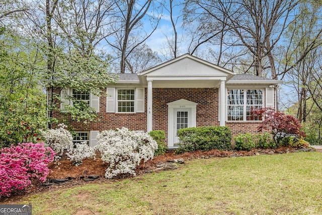 2183 Seaman Cir, Atlanta, GA 30341 - view of front of property with brick siding and a front yard