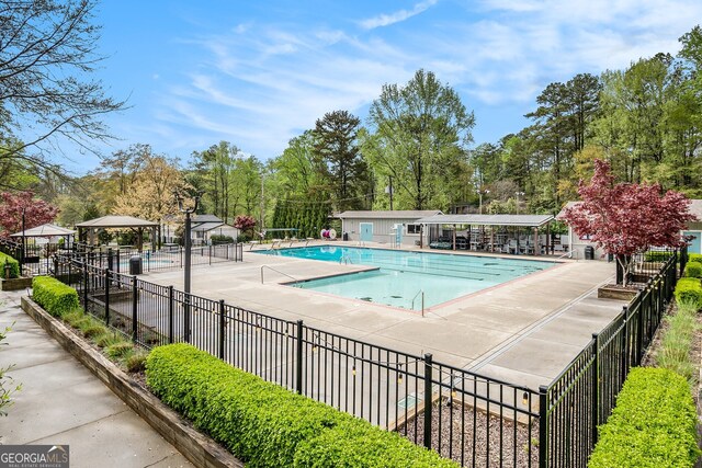 2183 Seaman Cir, Atlanta, GA 30341 - pool with fence and a patio