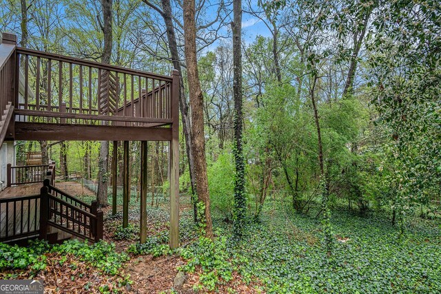 2183 Seaman Cir, Atlanta, GA 30341 - view of yard featuring a wooden deck and stairway