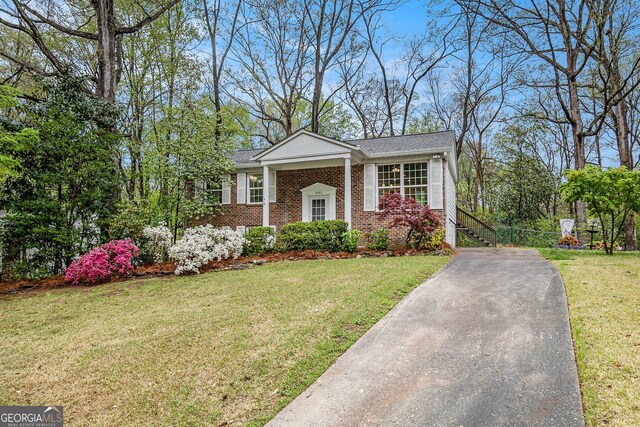 2183 Seaman Cir, Atlanta, GA 30341 - view of front of property with brick siding and a front yard