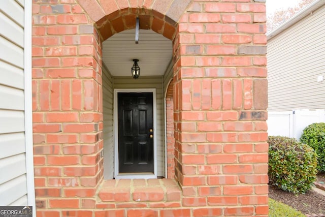 102 Manley Ct, Woodstock, GA 30188 - doorway to property featuring brick siding